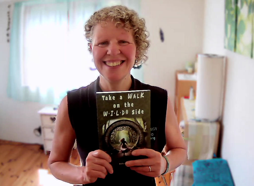 Robyn Harris with her book, Take a Walk on the W·I·L·D® Side