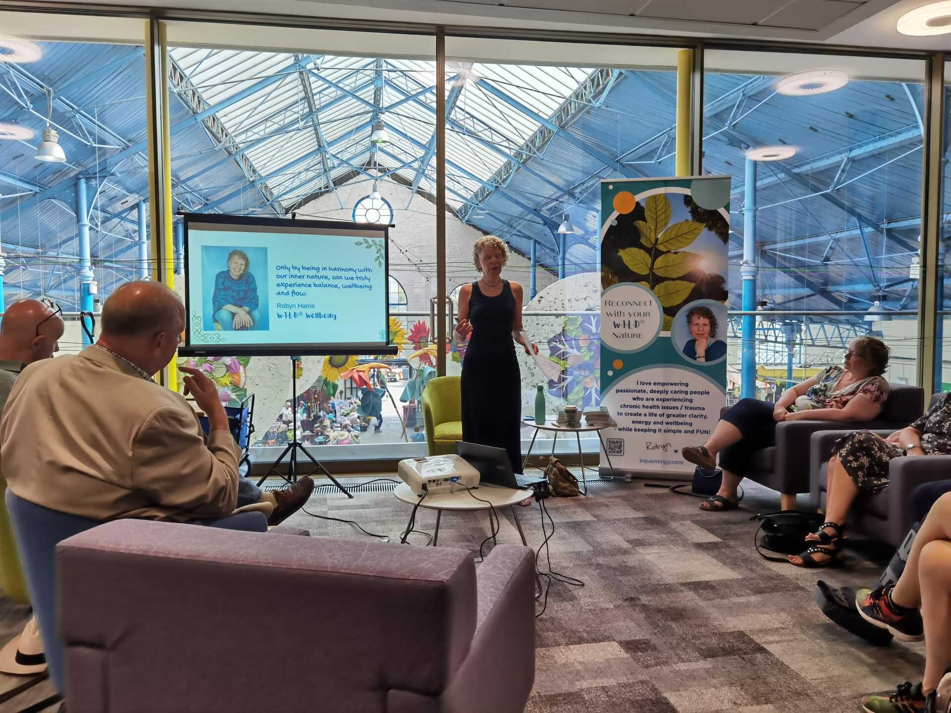 Robyn Harris speaking at the launch of her book, Take a Walk on the W·I·L·D® Side